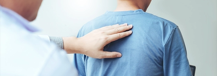 Chiropractic Parker CO Doctor Examining Patients Back